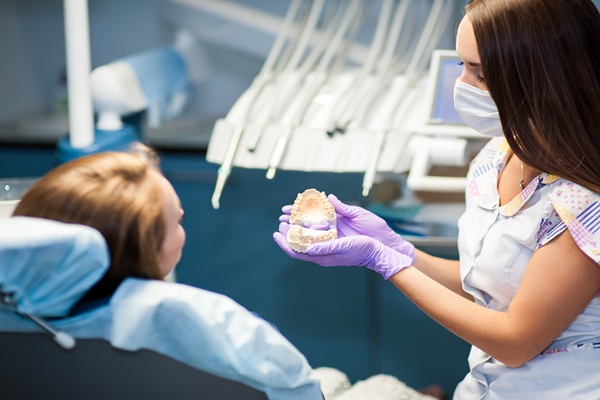 A Dental Implant And Crown For A Single Missing Tooth