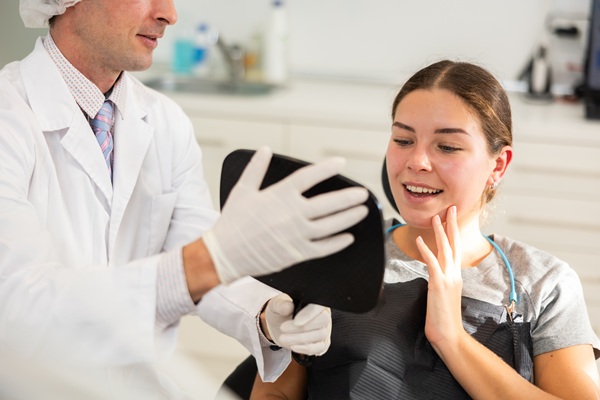 How A Restorative Dentist Helps Rebuild Your Smile